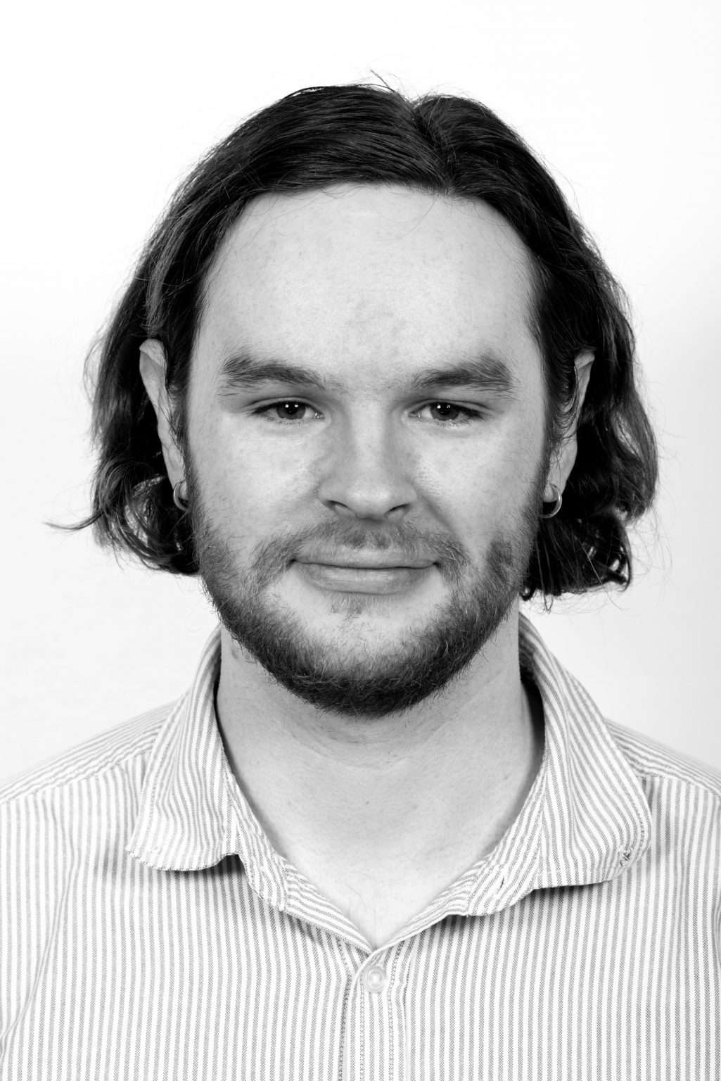 A headshot of our in-house Digital Designer and Editor, Tom Perrot